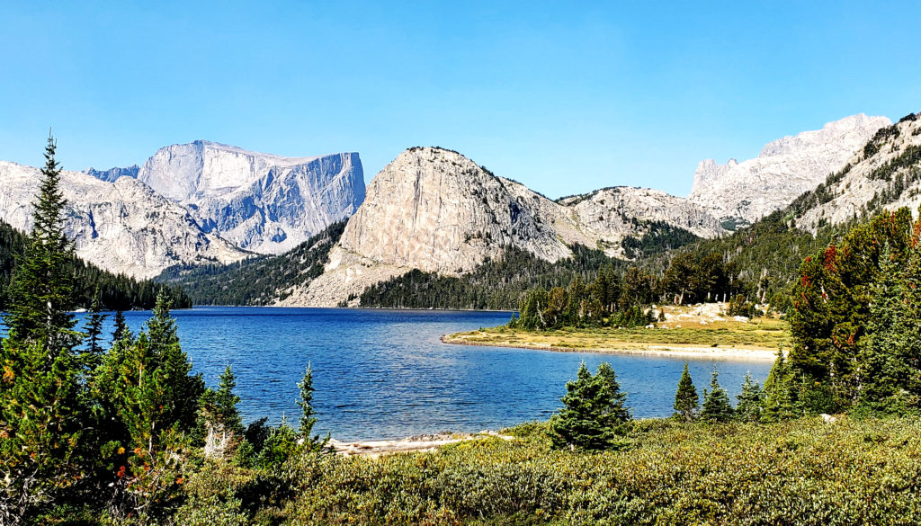 Grave Lake (Wind River Range, Wyoming) sits in the foreground with Mt. Hooker in the distance.